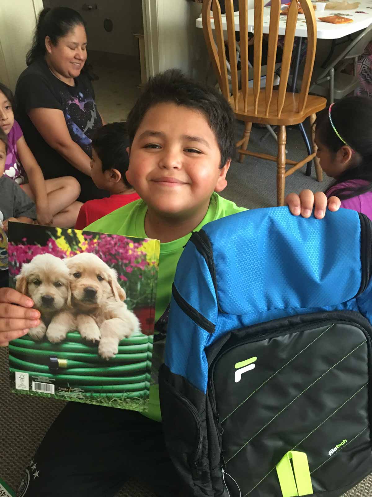 boy with school supplies