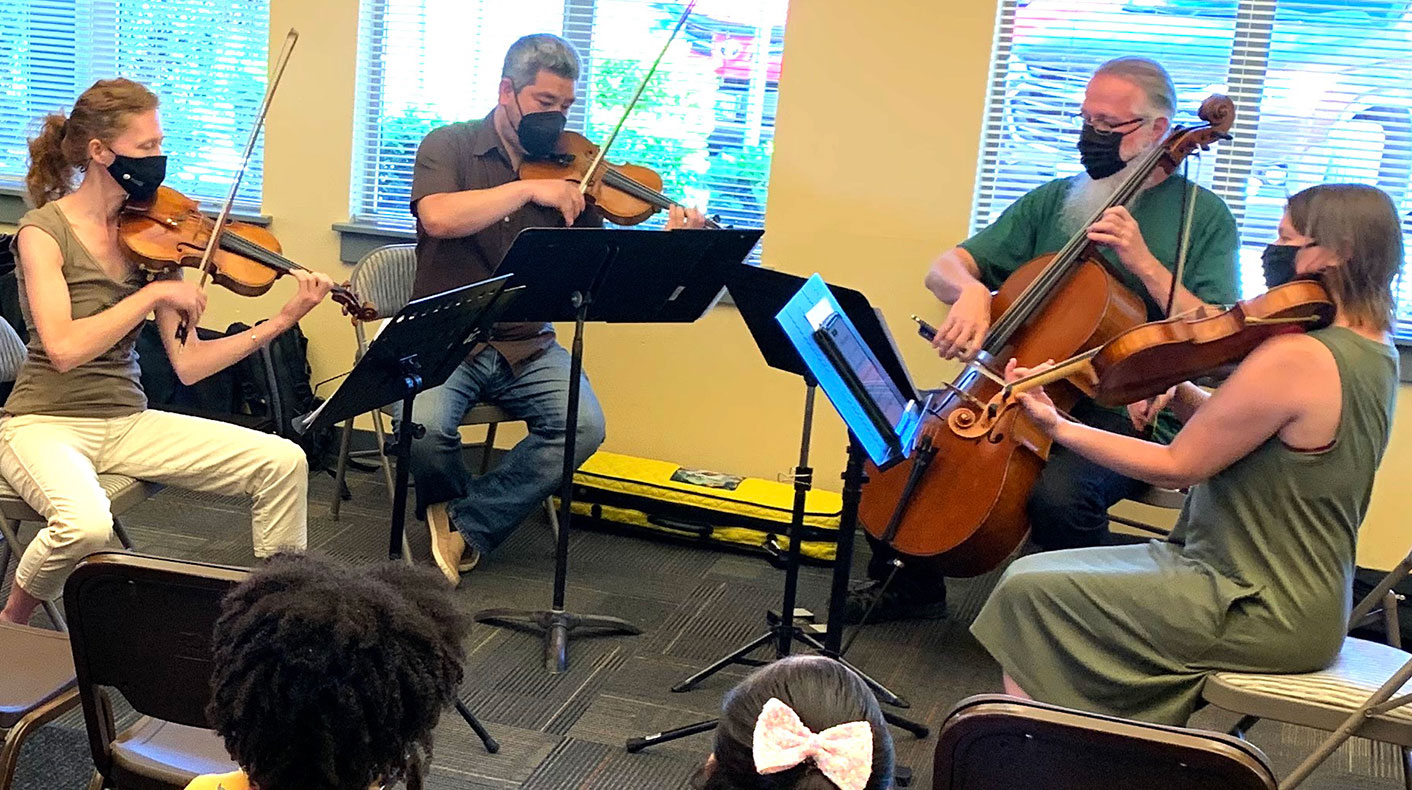 Symphony Connects performing at a residential property