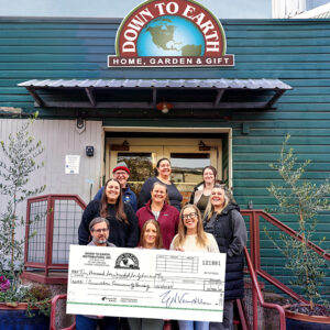 Presentation Of Home For The Holiday Fundraising Event's Check To CCH Staff