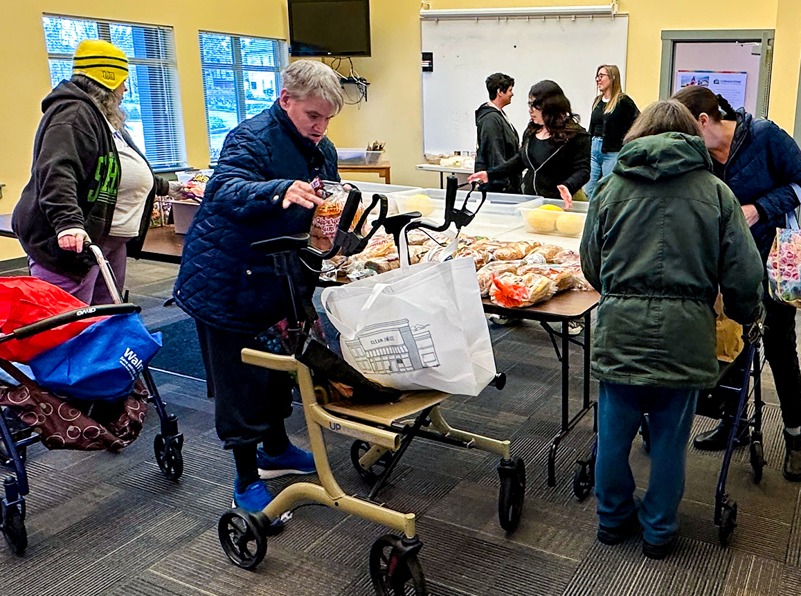 Residents at Willakenzie Crossings taking home delicious and nutritious free groceries