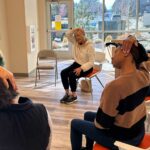 Residents doing chair yoga