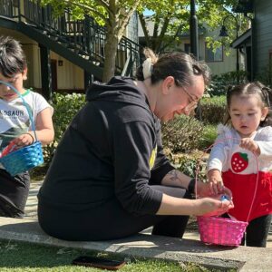 Photo of a mom and her daughter during egg hunt activity